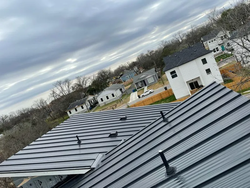 Standing seam metal roof panels with vents for Skylight Repair in Belle Fourche